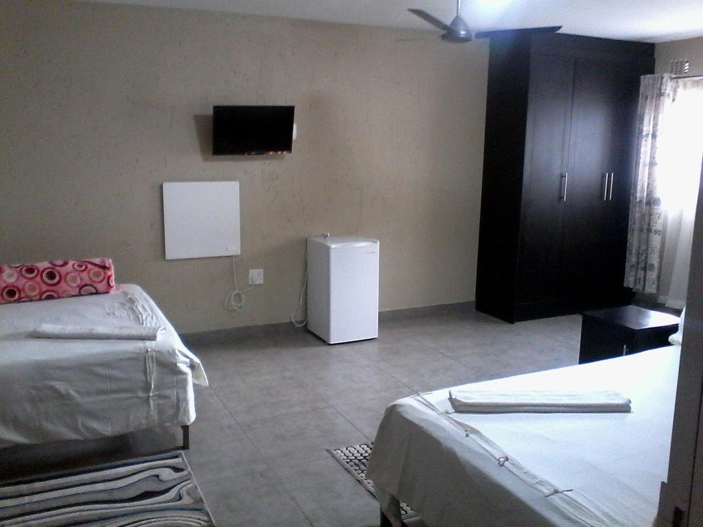 Chisam Guest Lodge Pty Ltd Johannesbourg Chambre photo