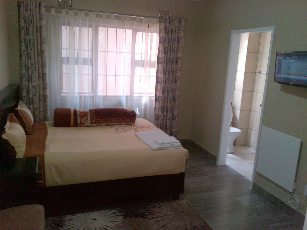 Chisam Guest Lodge Pty Ltd Johannesbourg Chambre photo